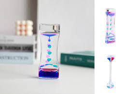 RELOJ ARENA LIQUIDA AZUL/ROSA 